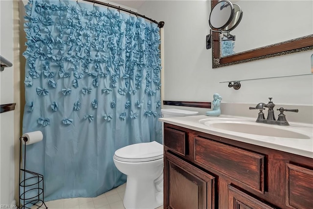 506 Everett Dr, Elizabeth City, NC 27909 - bathroom with toilet, vanity, and curtained shower