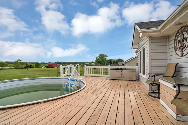 506 Everett Dr, Elizabeth City, NC 27909 - wooden terrace with an outdoor pool and a yard