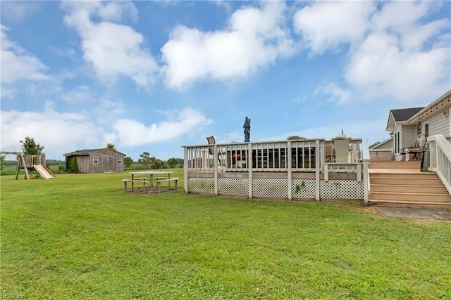 506 Everett Dr, Elizabeth City, NC 27909 - view of grassy yard featuring a deck and a playground