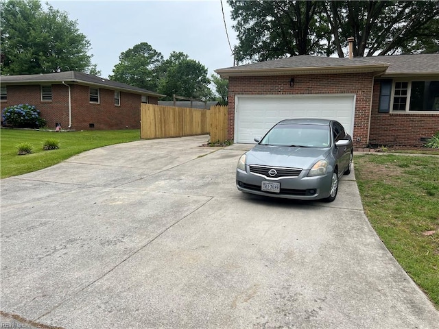 6217 Apple St, Suffolk, VA 23435 - view of home's exterior with concrete driveway, brick siding, and a garage