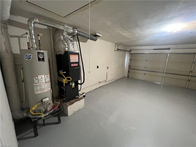 6217 Apple St, Suffolk, VA 23435 - garage featuring water heater and heating unit