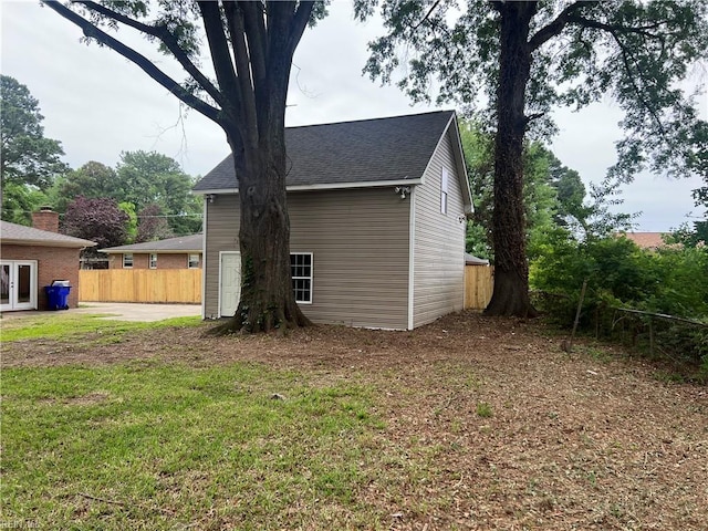 6217 Apple St, Suffolk, VA 23435 - view of property exterior featuring french doors and a shingled roof