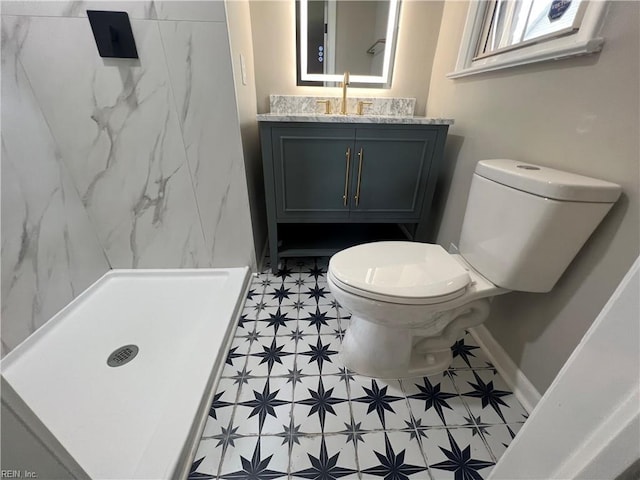 6217 Apple St, Suffolk, VA 23435 - bathroom with toilet, a marble finish shower, vanity, and baseboards