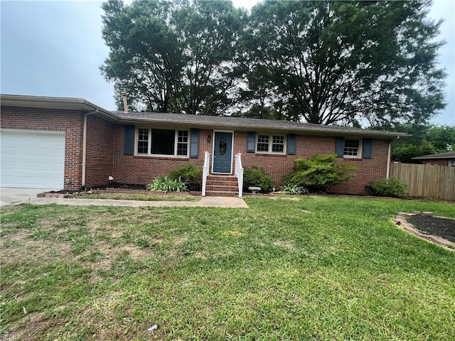 6217 Apple St, Suffolk, VA 23435 - ranch-style home featuring brick siding, an attached garage, entry steps, and driveway