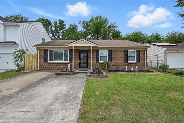 2405 Minnesota Ave, Norfolk, VA 23513 - view of front of property featuring brick siding and driveway