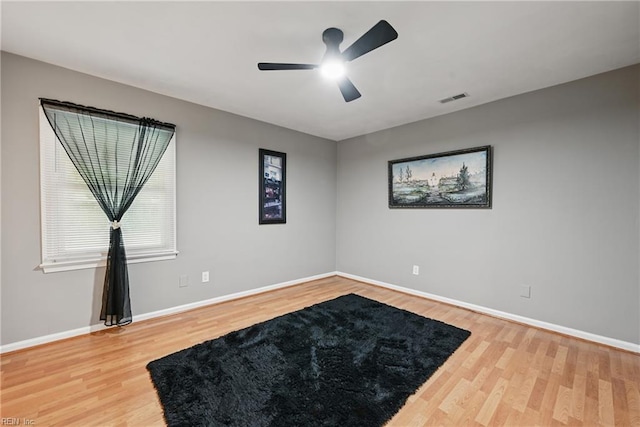 2405 Minnesota Ave, Norfolk, VA 23513 - spare room featuring ceiling fan, wood finished floors, and baseboards