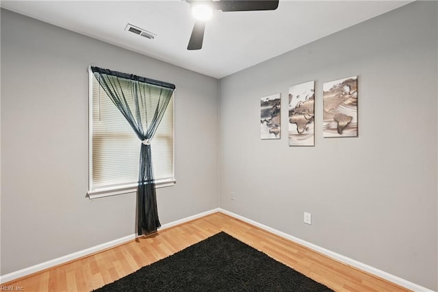 2405 Minnesota Ave, Norfolk, VA 23513 - unfurnished room featuring ceiling fan, wood finished floors, and baseboards
