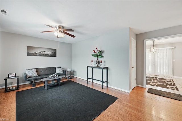 2405 Minnesota Ave, Norfolk, VA 23513 - living area featuring a ceiling fan, baseboards, and wood finished floors