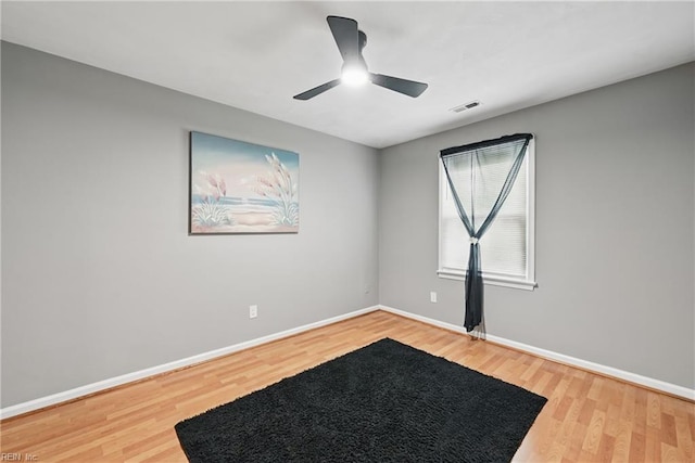 2405 Minnesota Ave, Norfolk, VA 23513 - unfurnished room featuring wood finished floors, baseboards, and a ceiling fan
