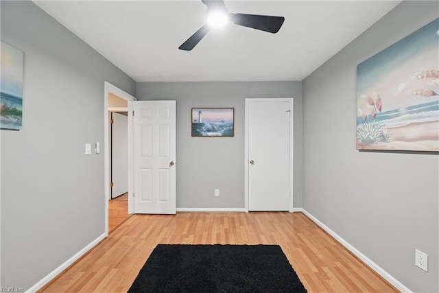 2405 Minnesota Ave, Norfolk, VA 23513 - unfurnished bedroom featuring wood finished floors, baseboards, and ceiling fan