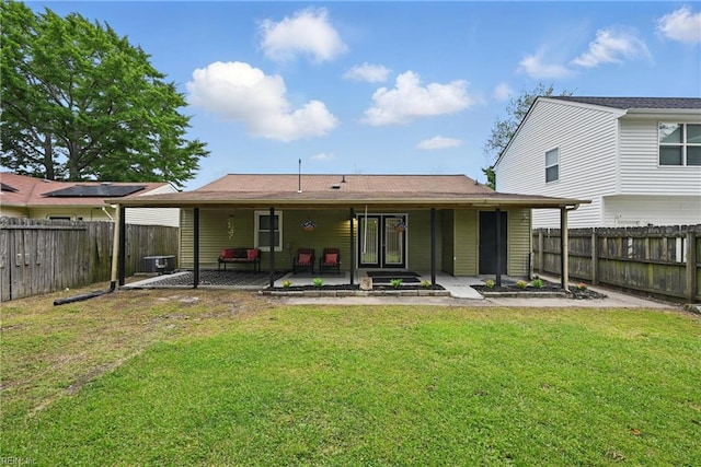 2405 Minnesota Ave, Norfolk, VA 23513 - back of property featuring a patio and central AC unit