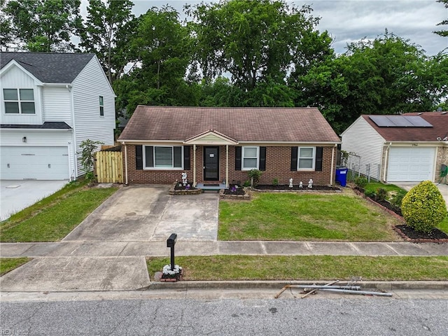 2405 Minnesota Ave, Norfolk, VA 23513 - view of front facade featuring brick siding and concrete driveway