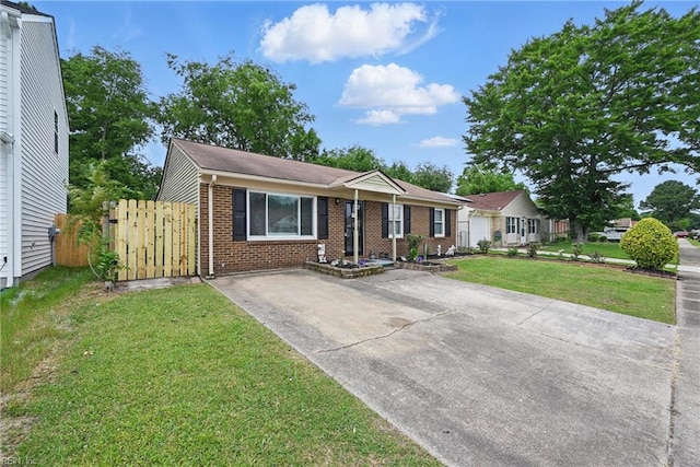 2405 Minnesota Ave, Norfolk, VA 23513 - ranch-style house featuring brick siding and driveway