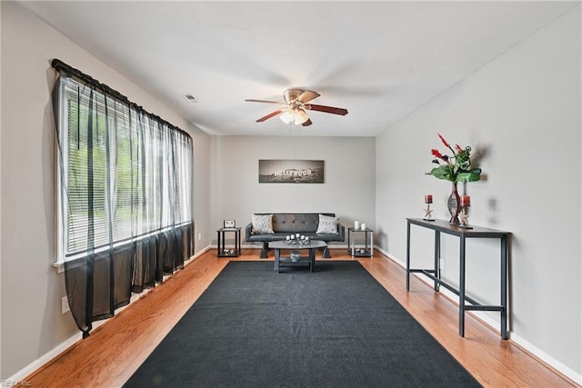 2405 Minnesota Ave, Norfolk, VA 23513 - living room featuring a ceiling fan, wood finished floors, and baseboards