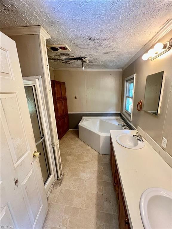15310 Loco School Rd, Stony Creek, VA 23882 - full bath with double vanity, a bath, crown molding, and a textured ceiling
