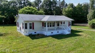 15310 Loco School Rd, Stony Creek, VA 23882 - view of front of home featuring covered porch, a front yard, and crawl space
