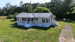 15310 Loco School Rd, Stony Creek, VA 23882 - view of front facade featuring a porch and a front yard