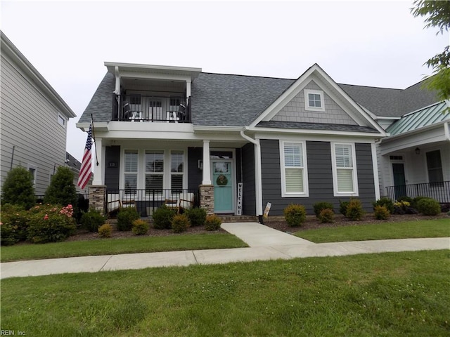 115 Creek Ln, Suffolk, VA 23435 - craftsman house with a balcony, covered porch, a shingled roof, and a front lawn