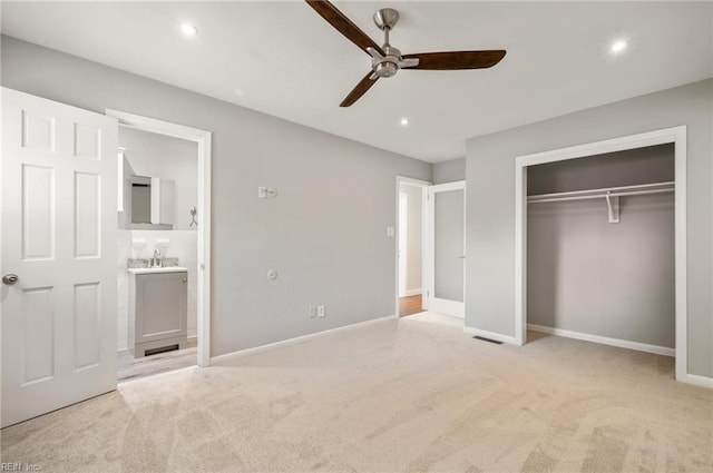 725 Lord Nelson Dr, Virginia Beach, VA 23464 - unfurnished bedroom with light carpet, a closet, baseboards, and recessed lighting