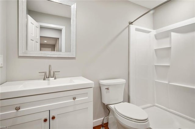725 Lord Nelson Dr, Virginia Beach, VA 23464 - bathroom with a shower, toilet, vanity, and wood finished floors