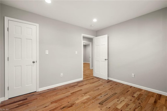 725 Lord Nelson Dr, Virginia Beach, VA 23464 - unfurnished bedroom featuring baseboards, recessed lighting, and light wood-style flooring