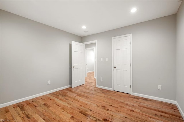 725 Lord Nelson Dr, Virginia Beach, VA 23464 - unfurnished bedroom with baseboards, light wood-style flooring, and recessed lighting