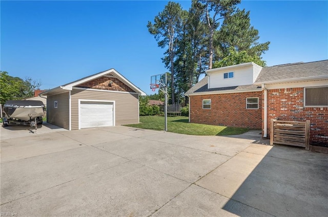 725 Lord Nelson Dr, Virginia Beach, VA 23464 - view of side of property with a lawn, a garage, brick siding, a shingled roof, and driveway