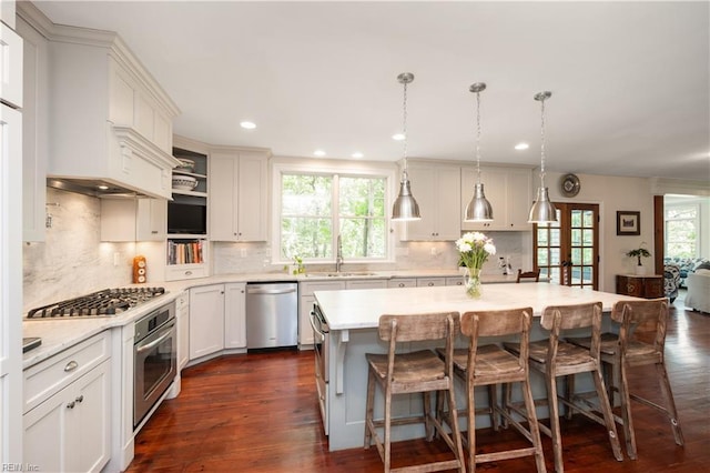 440 Goodspeed Rd, Virginia Beach, VA 23451 - kitchen featuring appliances with stainless steel finishes, a sink, light countertops, dark wood-style flooring, and recessed lighting
