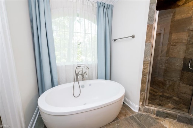 440 Goodspeed Rd, Virginia Beach, VA 23451 - bathroom with a freestanding bath, baseboards, and a stall shower