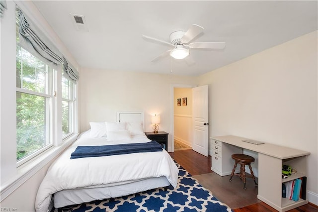 440 Goodspeed Rd, Virginia Beach, VA 23451 - bedroom with multiple windows, dark wood-type flooring, baseboards, and a ceiling fan