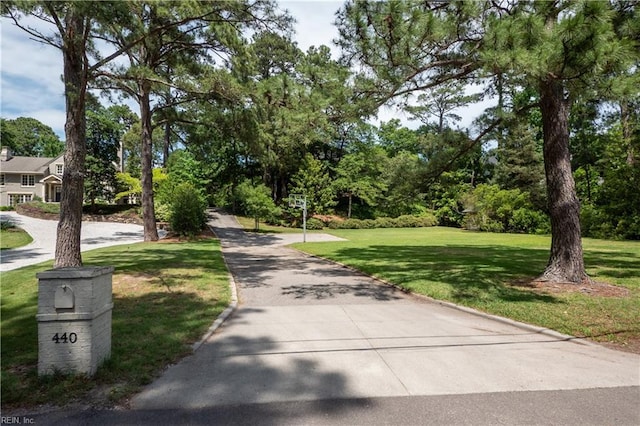 440 Goodspeed Rd, Virginia Beach, VA 23451 - surrounding community featuring a yard and view of wooded area