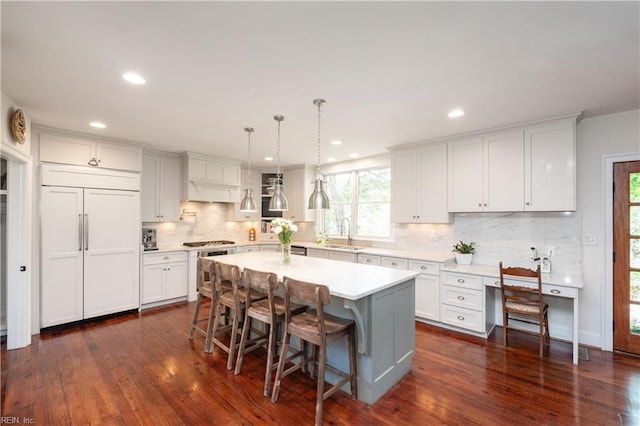 440 Goodspeed Rd, Virginia Beach, VA 23451 - kitchen featuring a sink, decorative backsplash, stainless steel appliances, a center island, and light countertops