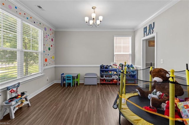 3745 Peterson St, Norfolk, VA 23513 - rec room featuring healthy amount of natural light, a chandelier, ornamental molding, wood finished floors, and baseboards
