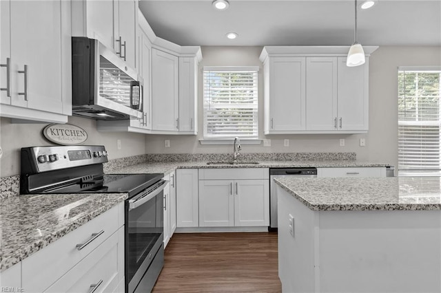 3745 Peterson St, Norfolk, VA 23513 - kitchen featuring appliances with stainless steel finishes, a sink, recessed lighting, white cabinetry, and dark wood-style floors