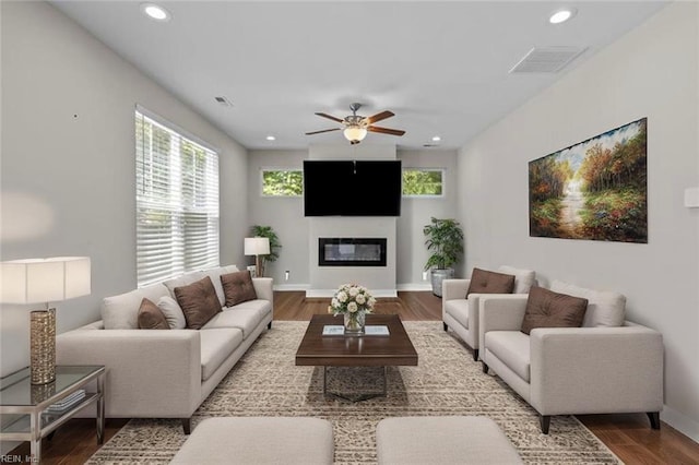 3745 Peterson St, Norfolk, VA 23513 - living area with a ceiling fan, a glass covered fireplace, wood finished floors, recessed lighting, and baseboards