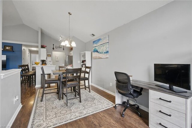 405 Adkins Arch Arch, Virginia Beach, VA 23462 - dining space with vaulted ceiling, dark wood-type flooring, a chandelier, a desk, and baseboards