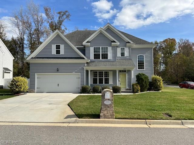 501 Beagle Gap Ct, Chesapeake, VA 23320 - traditional-style house with driveway, a front yard, and a garage