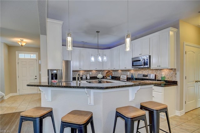 501 Beagle Gap Ct, Chesapeake, VA 23320 - kitchen featuring stainless steel appliances, light tile patterned floors, and tasteful backsplash