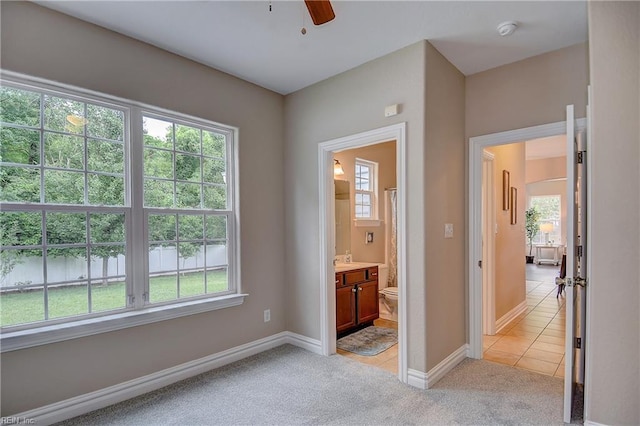 501 Beagle Gap Ct, Chesapeake, VA 23320 - unfurnished bedroom with multiple windows, baseboards, and ensuite bathroom