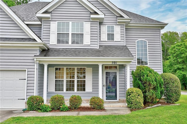 501 Beagle Gap Ct, Chesapeake, VA 23320 - traditional-style home with a shingled roof, covered porch, and a garage