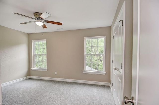 501 Beagle Gap Ct, Chesapeake, VA 23320 - carpeted empty room featuring healthy amount of natural light, baseboards, and ceiling fan