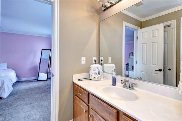 604 Schooner Blvd, Williamsburg, VA 23185 - ensuite bathroom with ornamental molding, vanity, and baseboards