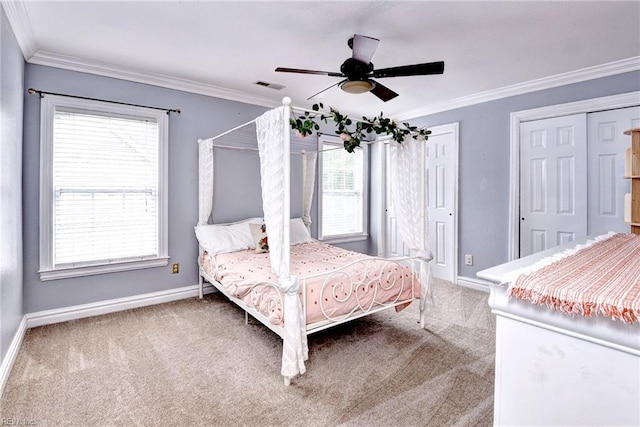 604 Schooner Blvd, Williamsburg, VA 23185 - bedroom featuring carpet floors, baseboards, crown molding, ceiling fan, and two closets