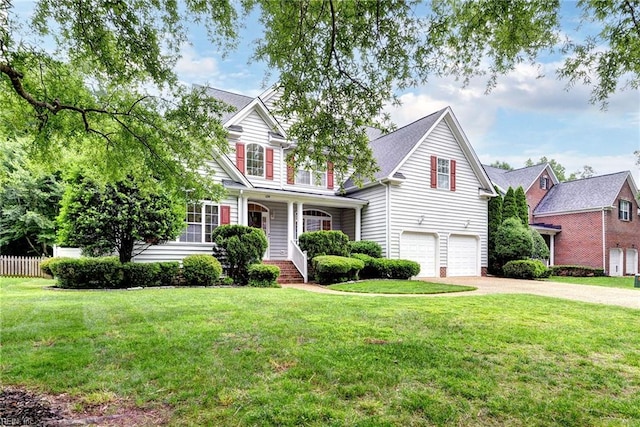 604 Schooner Blvd, Williamsburg, VA 23185 - traditional-style house featuring a garage, driveway, and covered porch