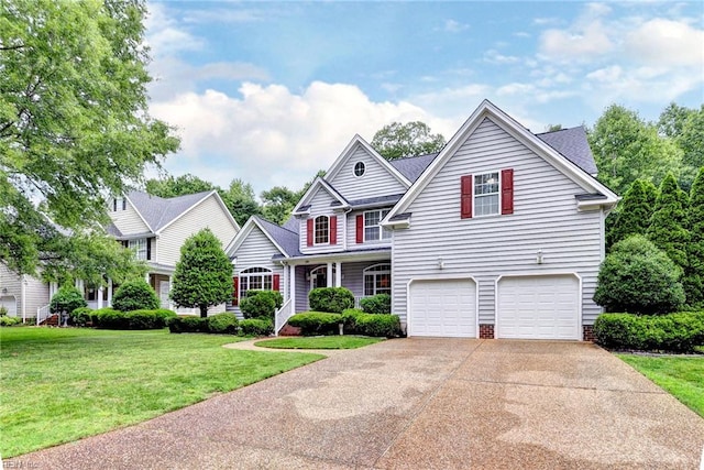 604 Schooner Blvd, Williamsburg, VA 23185 - traditional-style home featuring an attached garage, driveway, and a front lawn
