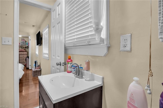 2020 County St, Portsmouth, VA 23704 - bathroom featuring vanity and wood finished floors