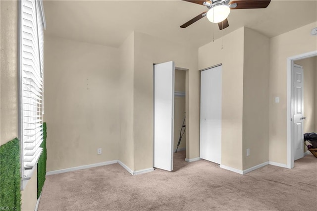 2020 County St, Portsmouth, VA 23704 - unfurnished bedroom featuring carpet, baseboards, and a ceiling fan