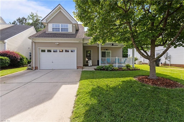 2612 Einstein Dr, Virginia Beach, VA 23456 - view of front facade with a porch, concrete driveway, a front lawn, a shingled roof, and a garage
