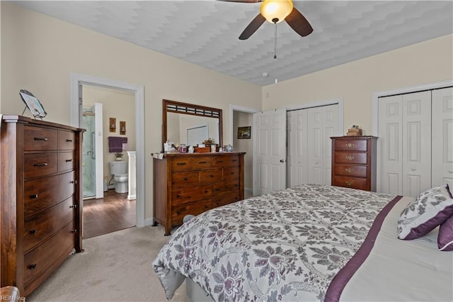 2612 Einstein Dr, Virginia Beach, VA 23456 - bedroom featuring multiple closets, light carpet, and ceiling fan