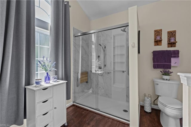 2612 Einstein Dr, Virginia Beach, VA 23456 - full bathroom with wood finished floors, toilet, and a marble finish shower